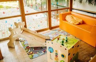 Parent-child corner in the refectory's conservatory area