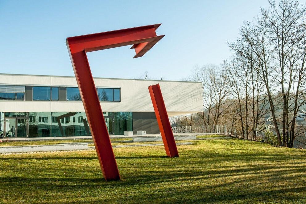 Aluminium sculpture by Erich Reusch in the meadow behind the FIM Building