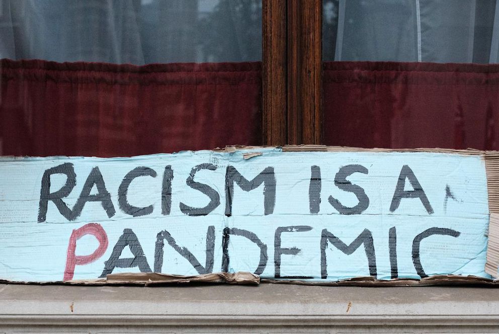 Demo-Plakat: Racism is a pandemic
