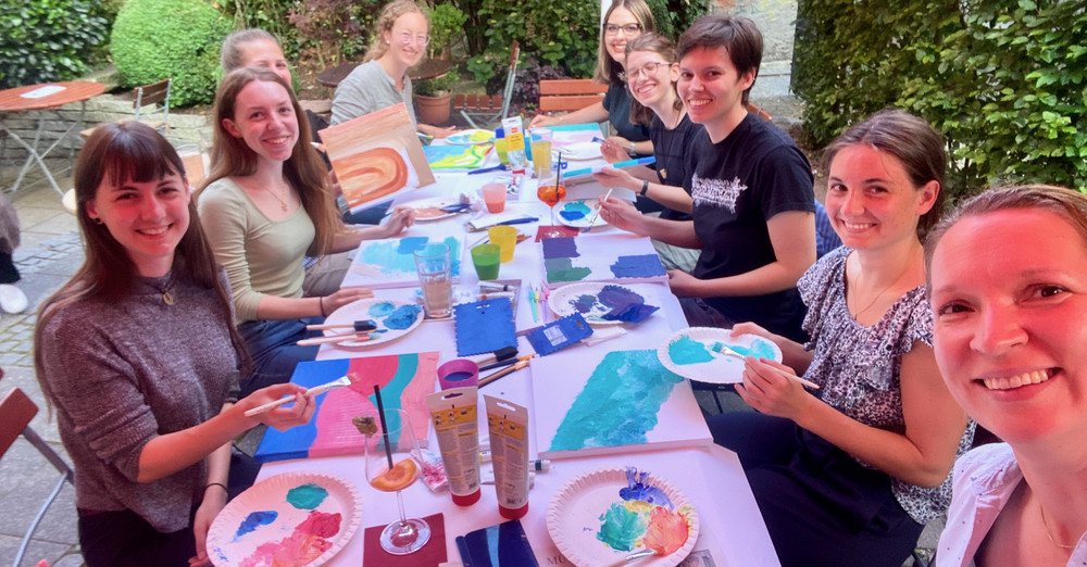 Participants ot the Colour-Night event painting pictures