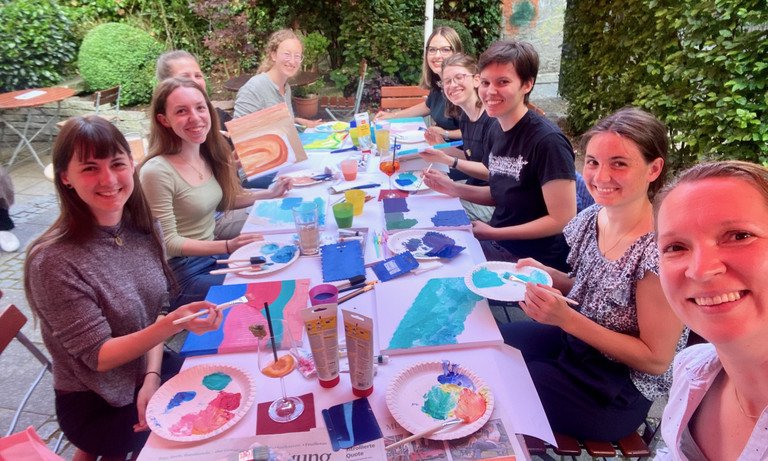 Participants ot the Colour-Night event painting pictures