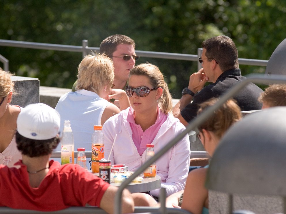 Students on the terrace in front of one of the cafeterias