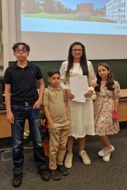 Shams Aldden with her children