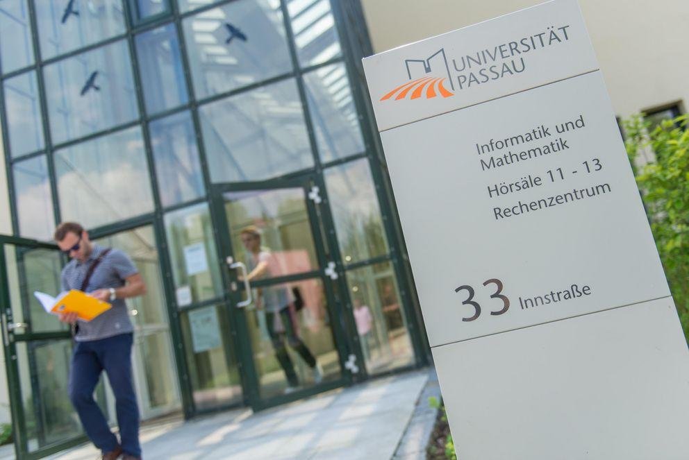 A student leaving the FIM building A student leaving the FIM building