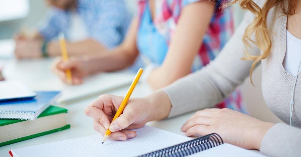 Students with writing pad