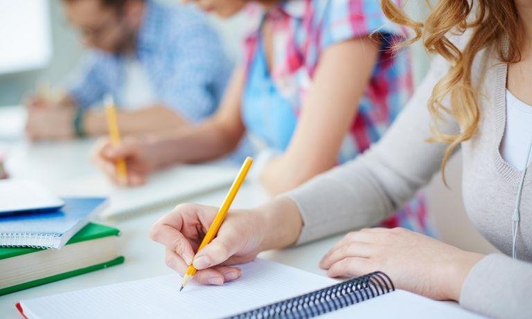 Students with writing pad