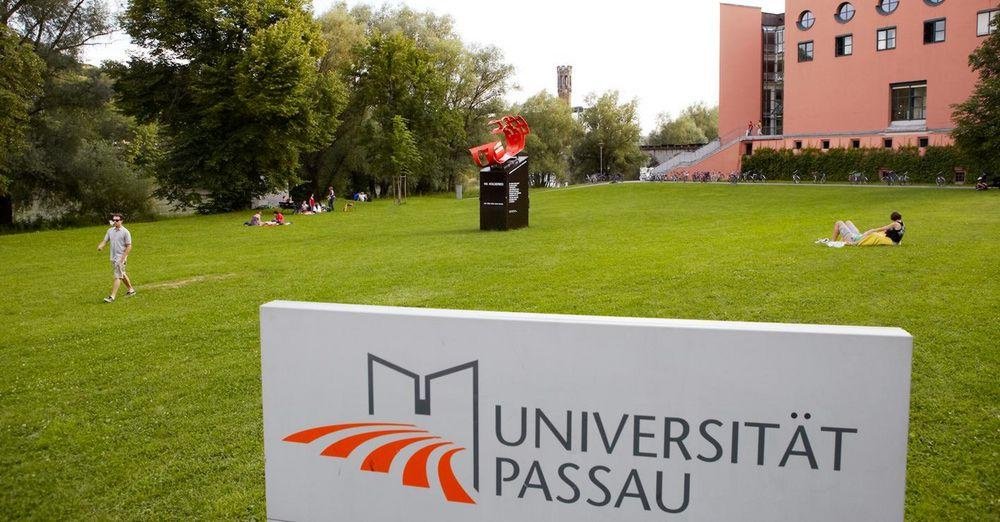 Stele with university logo