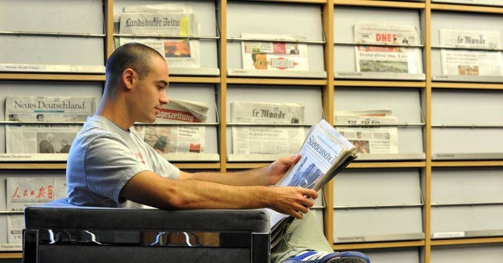 Student with newspaper