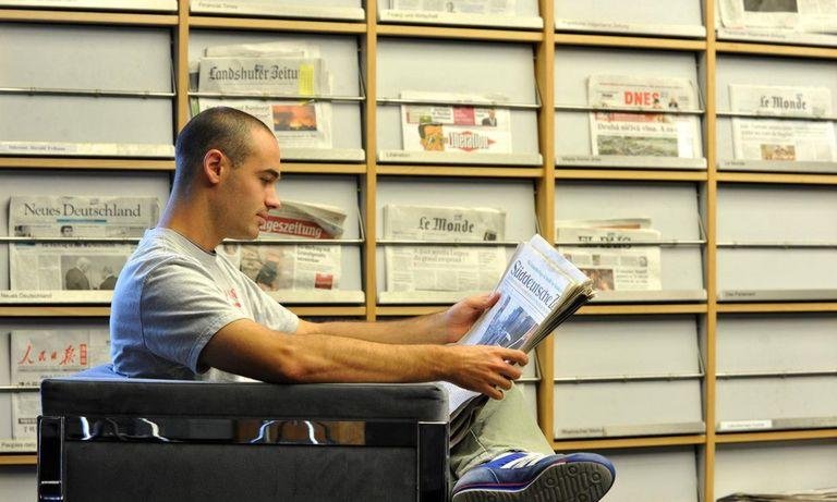 Student with newspaper