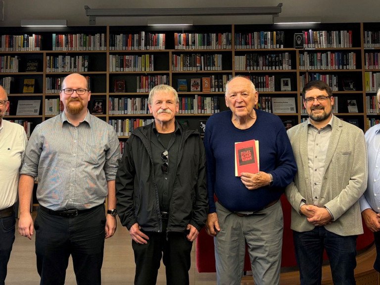 Prof. Decker, Mr Krieg and Prof. Pabisch (among others) in the Library Lounge