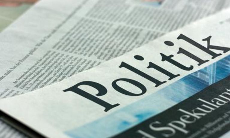 Newspaper with the headline "Politics"