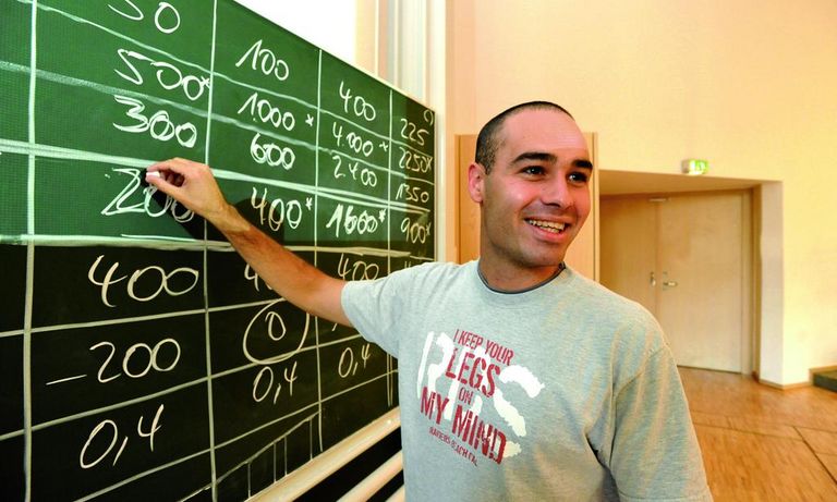 Student at a blackboard