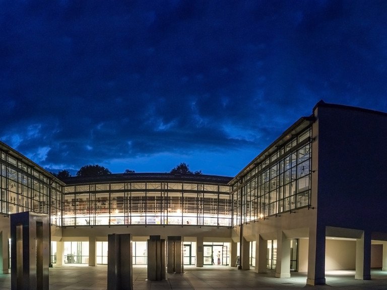 The library entrance at night