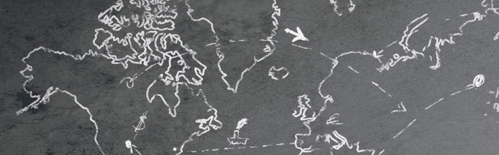 The world map drawn on a blackboard (symbolic image)