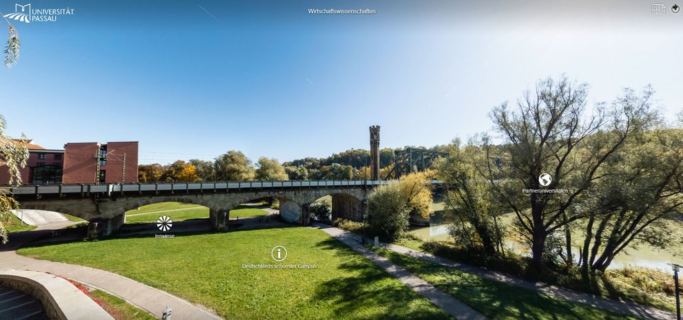 Virtual campus tour screenshot: View towards railway bridge & river Inn