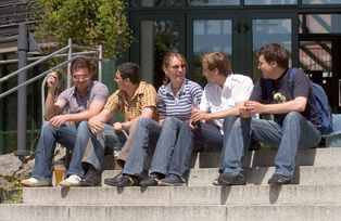 A group of students in front of the Main Lecture Theatre (Audimax)