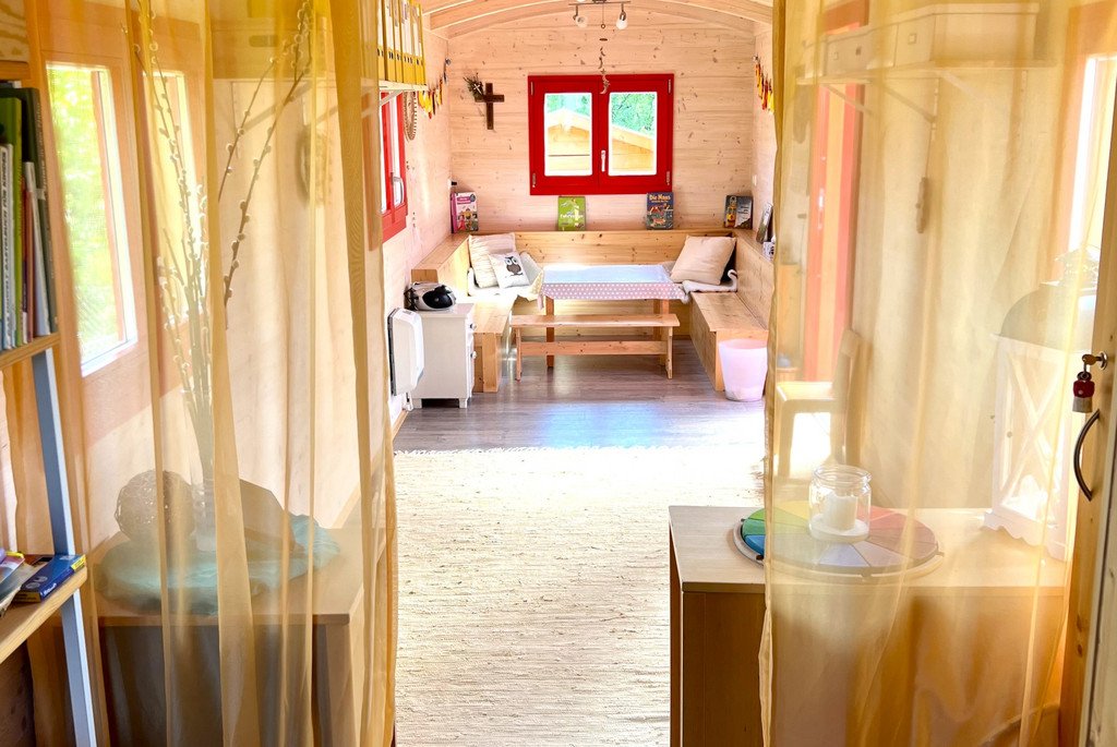 Interior view of centre and seating area of the kindergarten caravan
